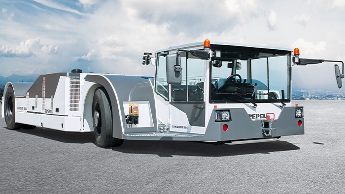 Aircraft must be backed into their parking position by tractors for safety reasons.